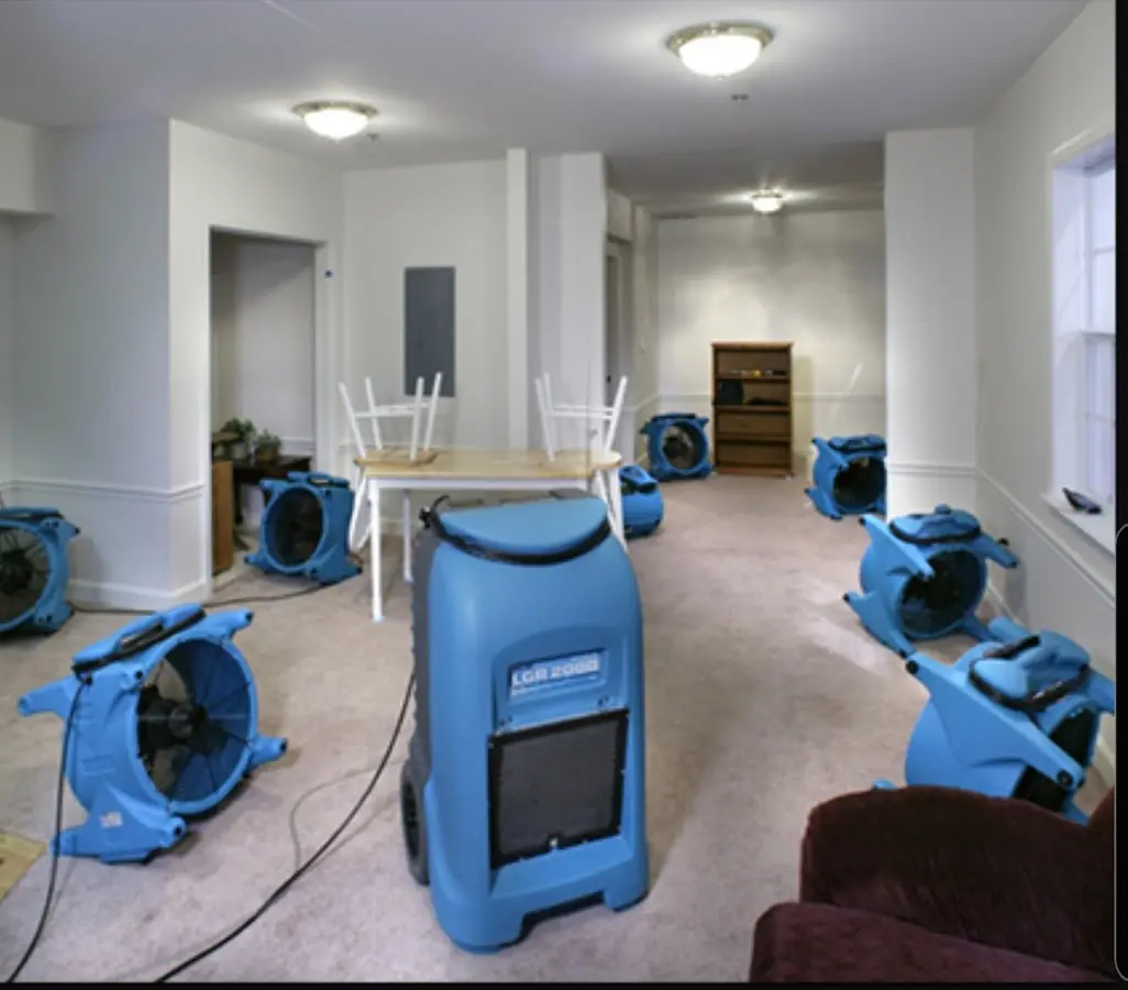 Air movers and dehumidifier setup for Water Damage Restoration in Westport